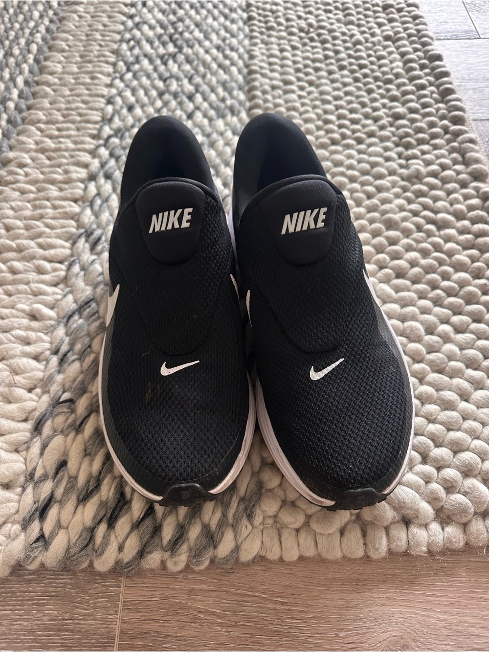 Nike Men’s Black Slip-On Athletic Sneakers with White Swoosh